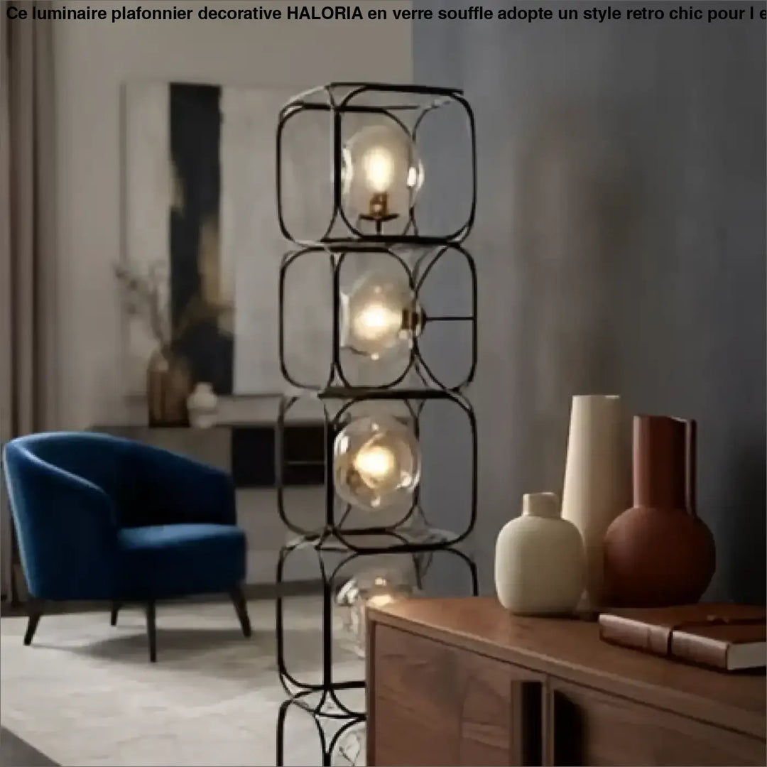Lampadaire design vertical luxora en cube metal noir avec diffuseurs lumineux et esprit artistique chaleureux