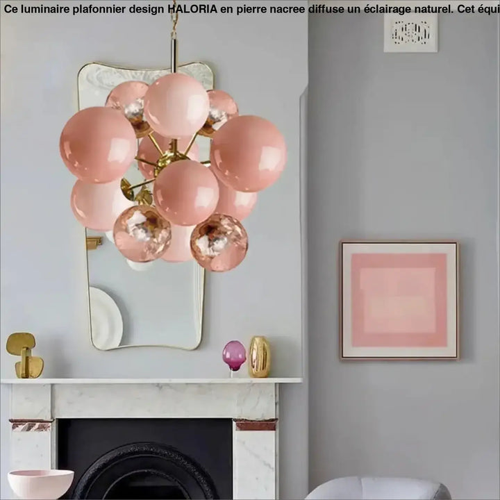 Suspension luminaire blast avec orbes en verre rose glossy et rose gold sur structure en laiton facile à entretenir lumière douce