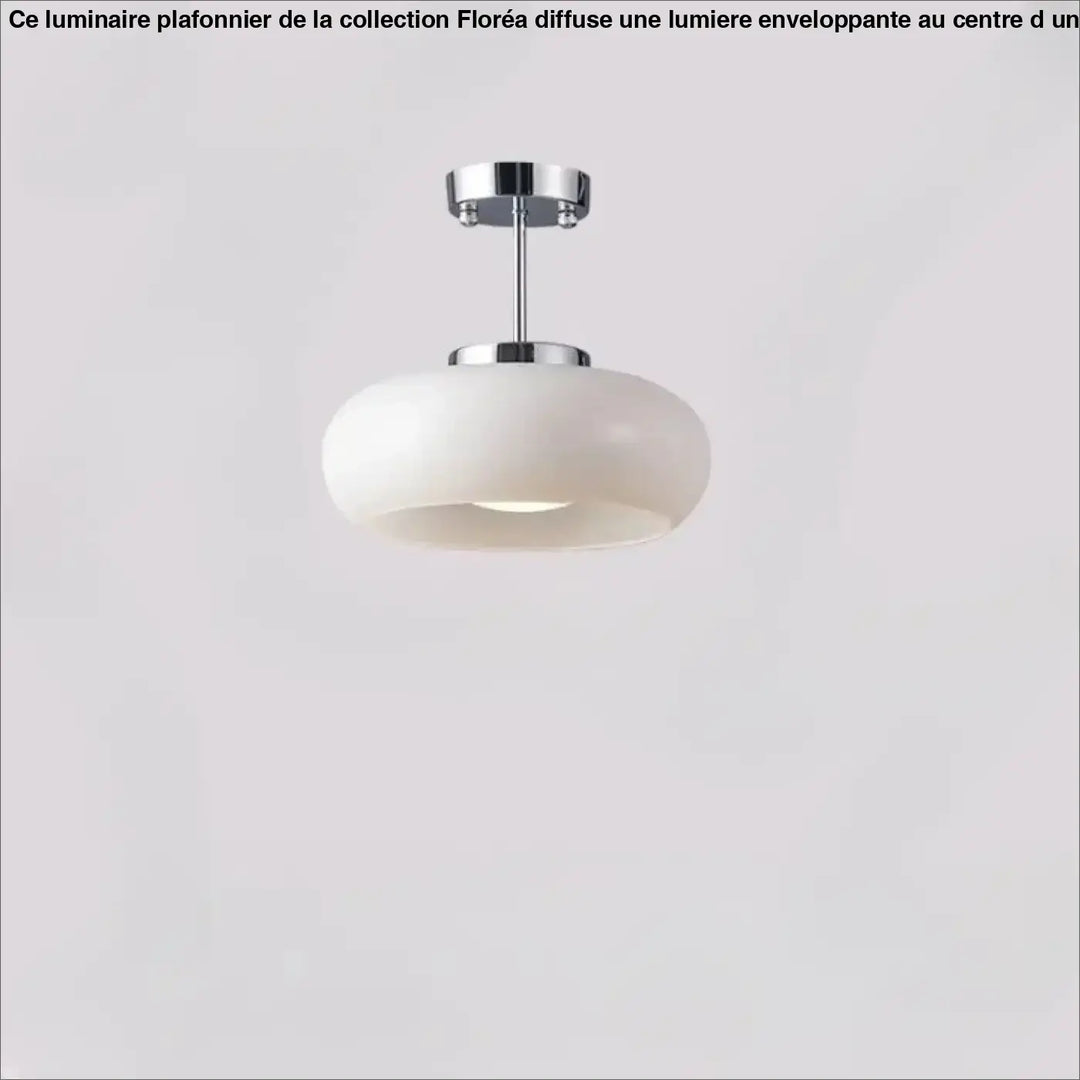 Suspension luminaire melora avec verre teinté aux courbes douces et fixation chrome moderne