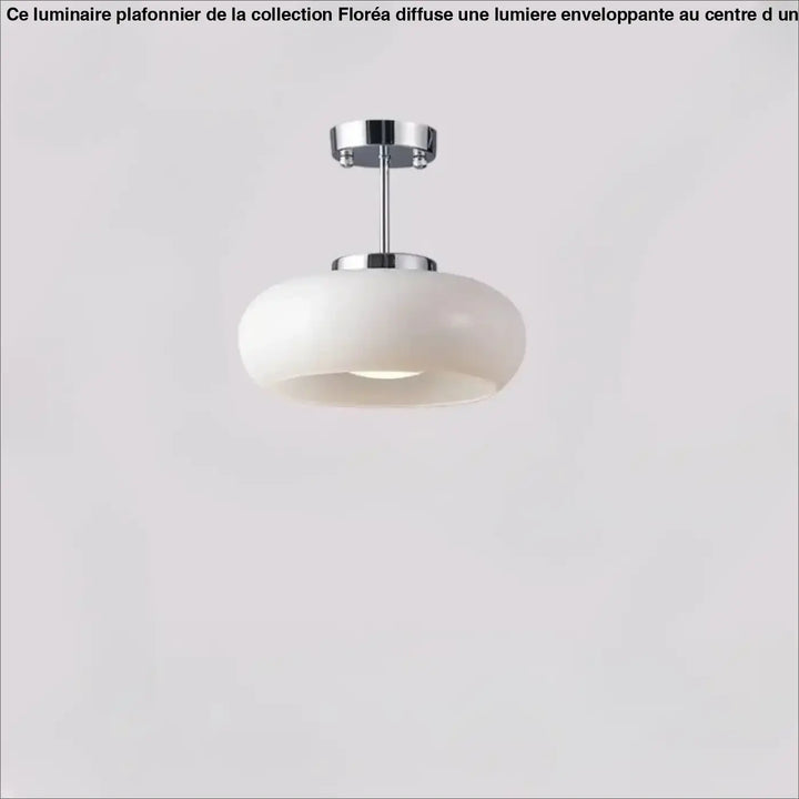 Suspension luminaire melora avec verre teinté aux courbes douces et fixation chrome moderne