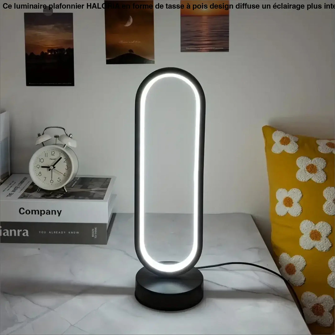 Veilleuse moderne santillana en forme ovale noire avec lumière led blanche en anneau lumineux