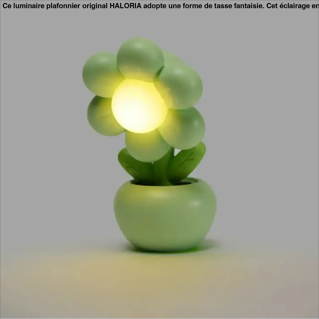 Veilleuse flower en forme de fleur verte avec lumière douce jaune au centre comme objet décoratif élégant