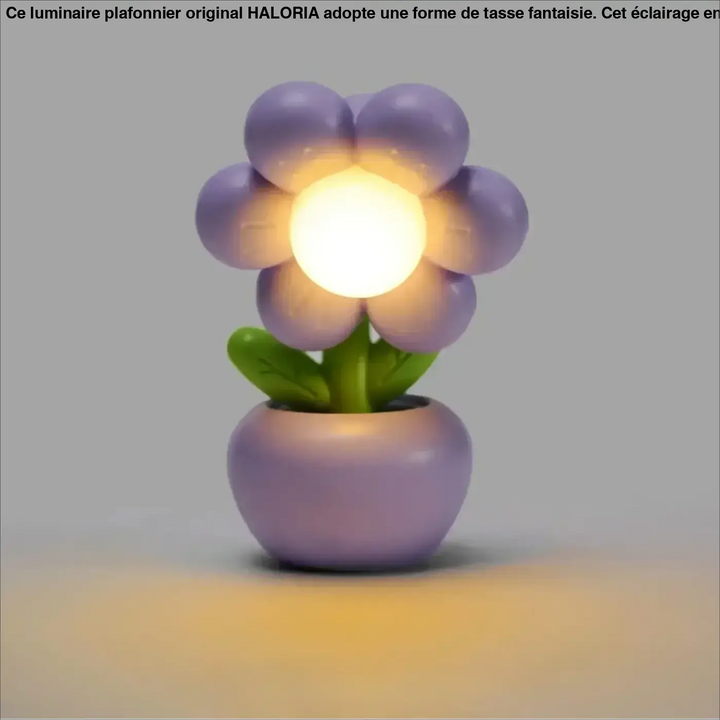 Veilleuse flow en forme de fleur violette avec lumière douce centrale et tige verte dans pot décoratif assorti