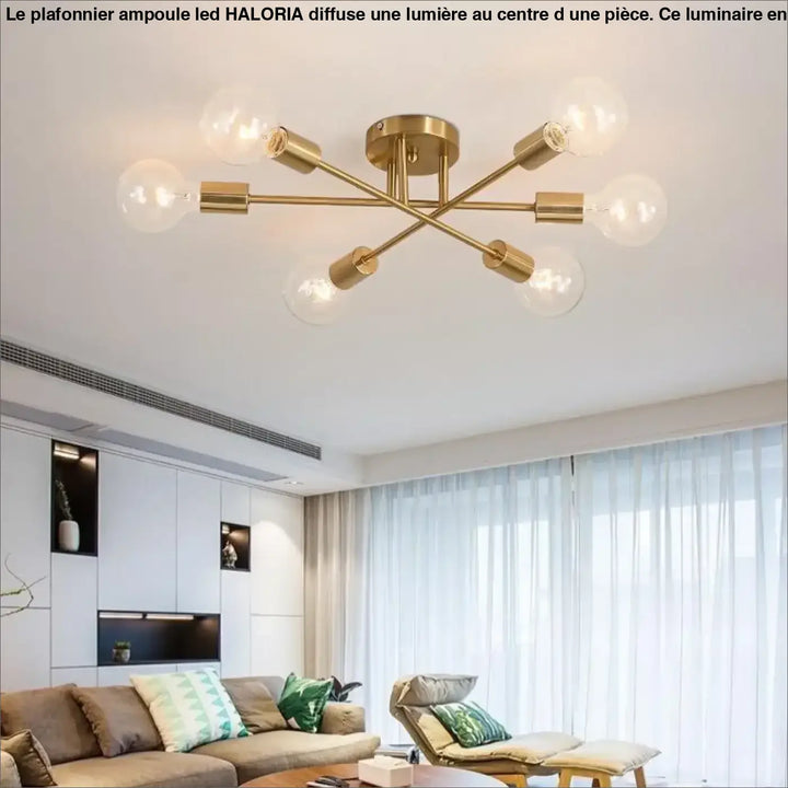 Plafonnier ampoule led haloria doré avec six douilles exposées en croix symétrique en laiton pour éclairage intérieur