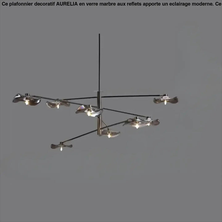 Suspension luminaire design vetros avec six abat-jours en verre feuille métalliques et tige centrale noire