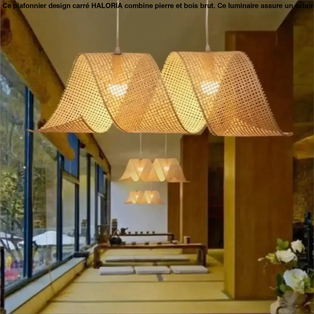 Plafonnier design carré en pierre et bois brut avec suspensions en bambou tressé au design courbe et lumière dorée chaleureuse