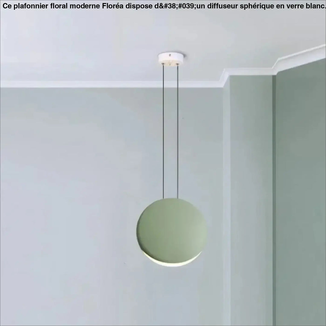 Suspension luminaire lunis sphérique minimaliste en vert sauge mat avec cordons noirs fins