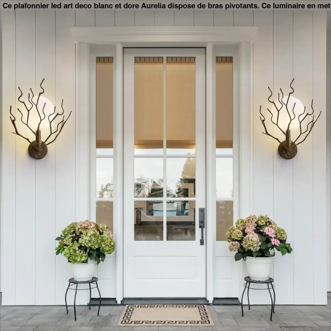 Applique murale design branches en métal et globe lumineux chic