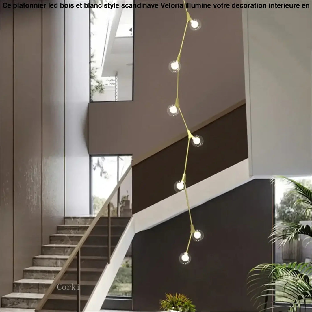 Suspension luminaire verticale en boules opales et laiton