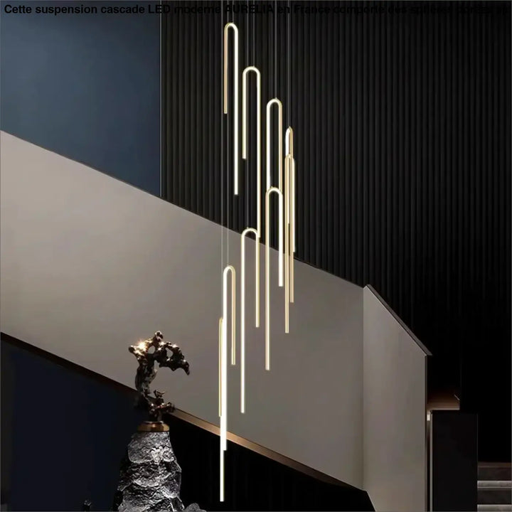 Suspension Cascade Cylindres Dorés Haut Plafond Moderne