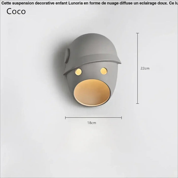 Suspension decorative enfant en céramique grise en forme de casque avec yeux jaunes lumineux et bouche ouverte