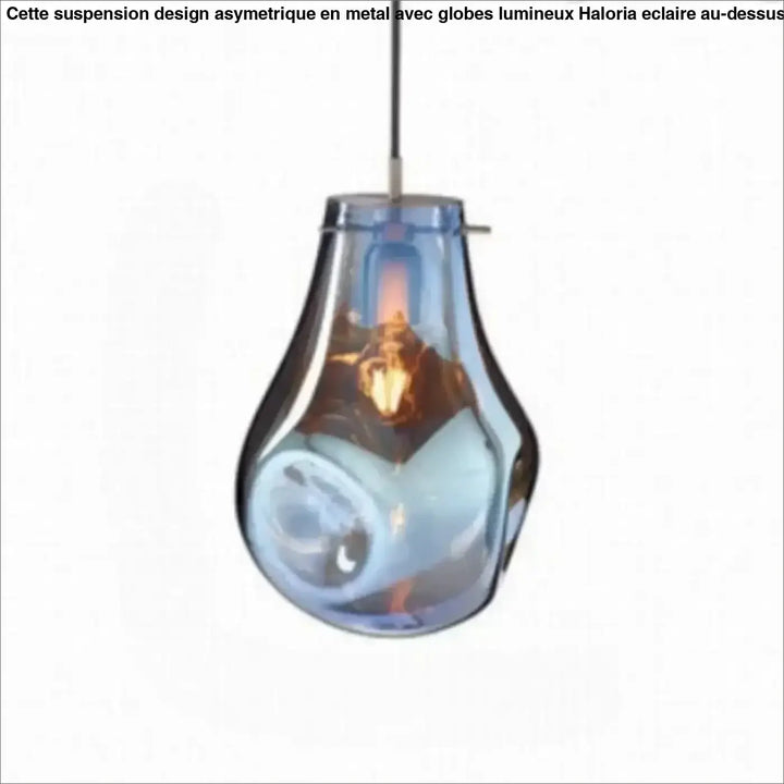 Suspension luminaire vulco en verre bleu translucide en forme de goutte avec des tourbillons subtils internes