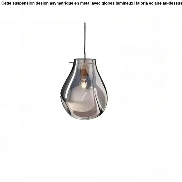 Suspension luminaire vulco avec abat-jour en verre gris translucide et ampoule à filament visible, forme goutte d’eau élégante