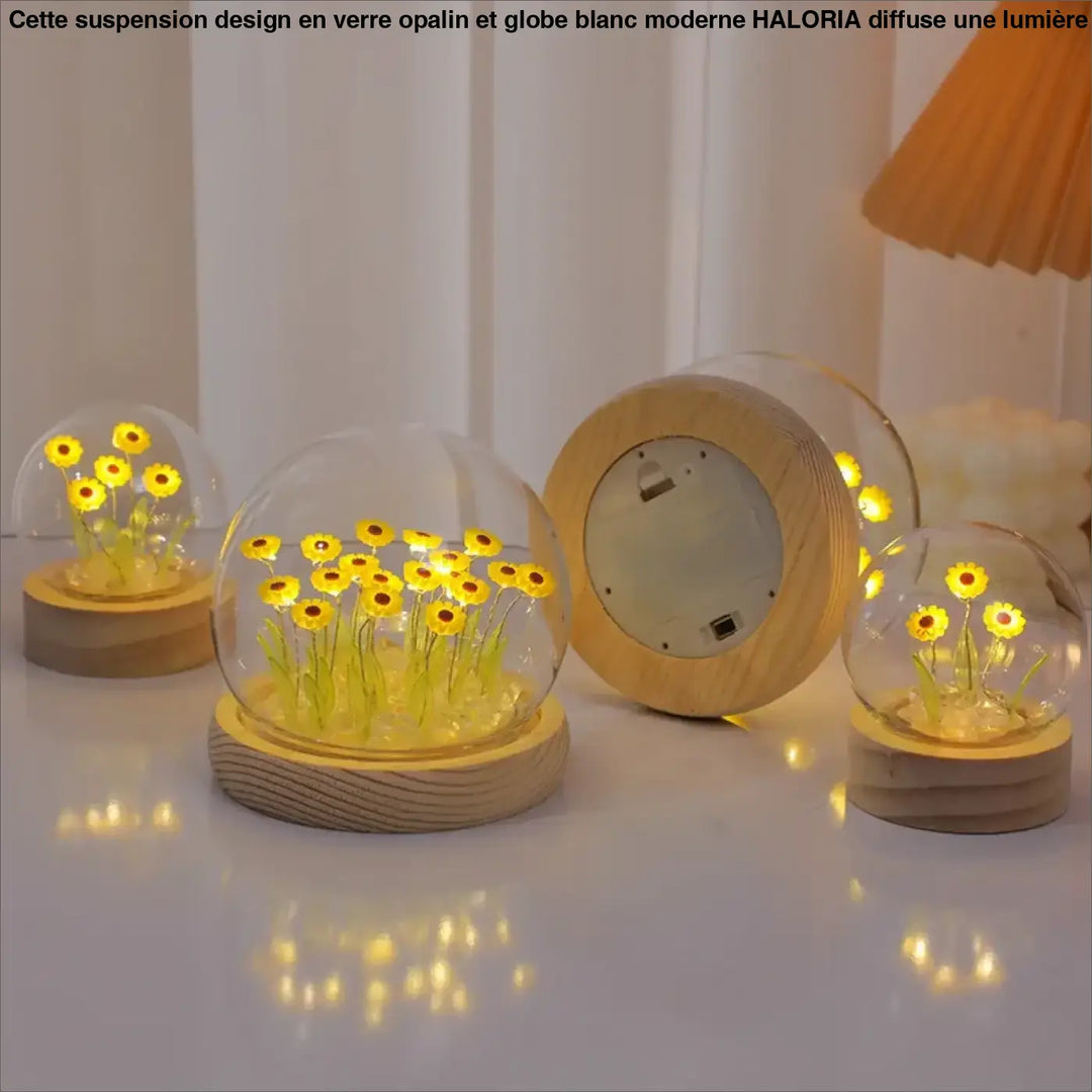 Veilleuse tournesol décorative helios en verre clair avec fleurs jaunes et leds chaudes sur base en bois rond