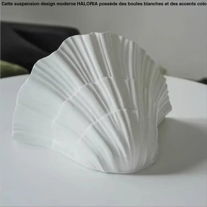 Applique murale blanche en forme de coquillage au style marin