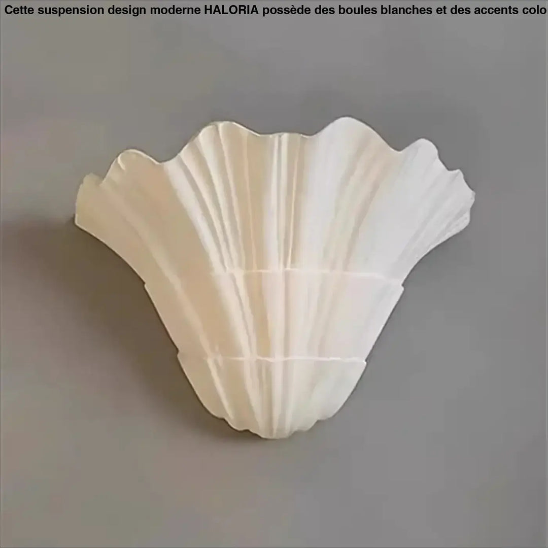 Applique murale blanche en forme de coquillage au style marin