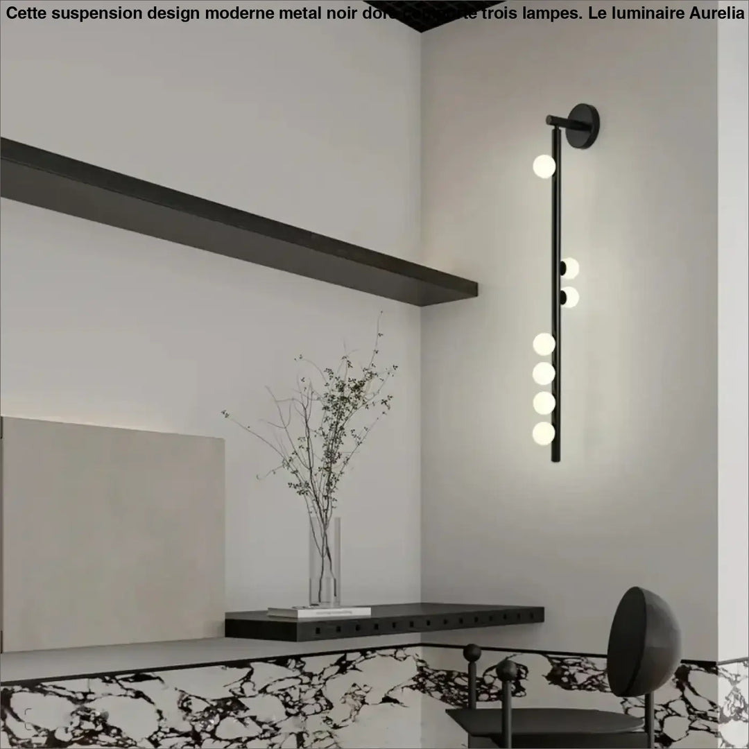 Applique murale dorée design avec des globes en verre
