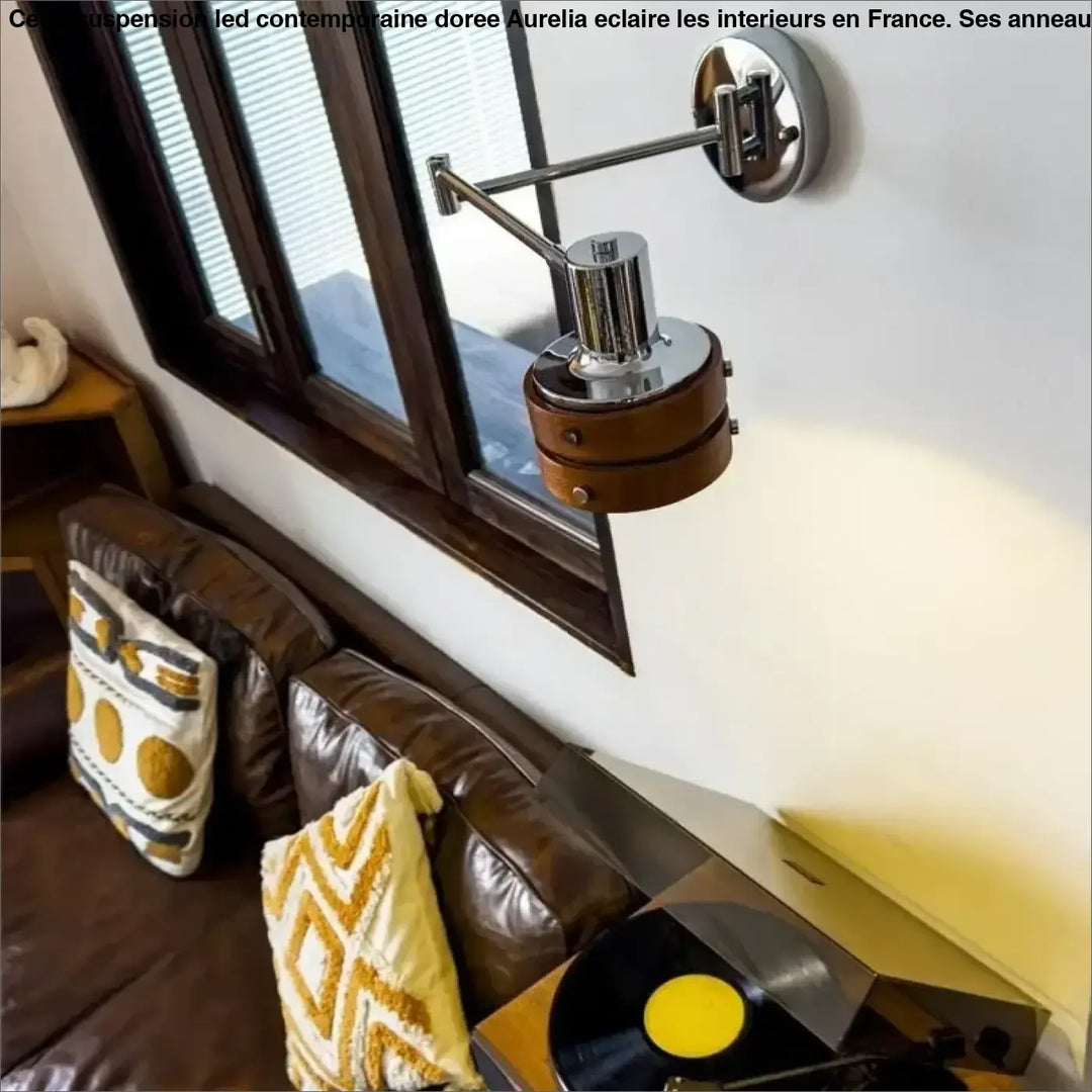 Chrome-finished suspension led contemporaine doree with adjustable wall sconce and circular wooden base by aurelia