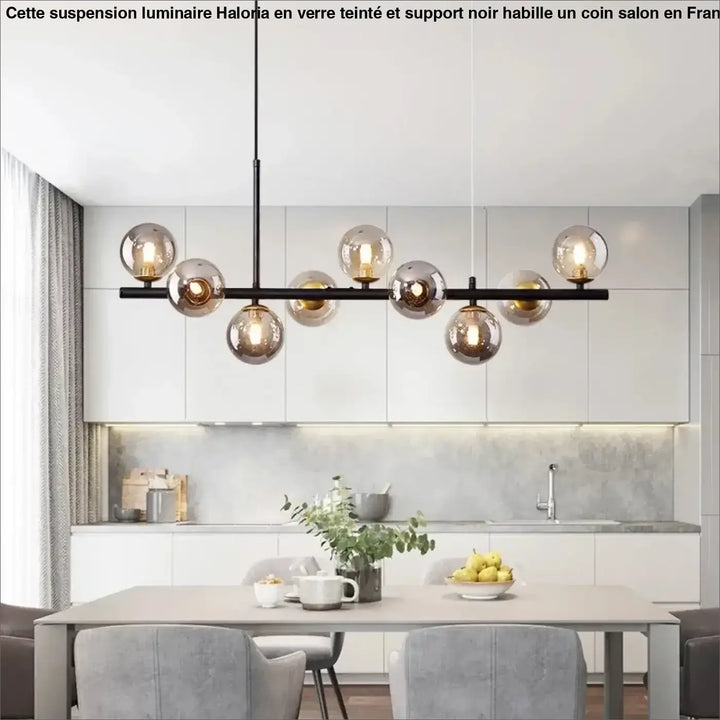 Suspension luminaire à boules de verre teinté sur un support noir

