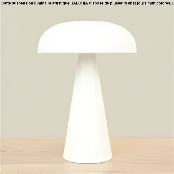 Lampe de table amelia en céramique blanche avec abat-jour arrondi lisse et base effilée pour salle à manger design