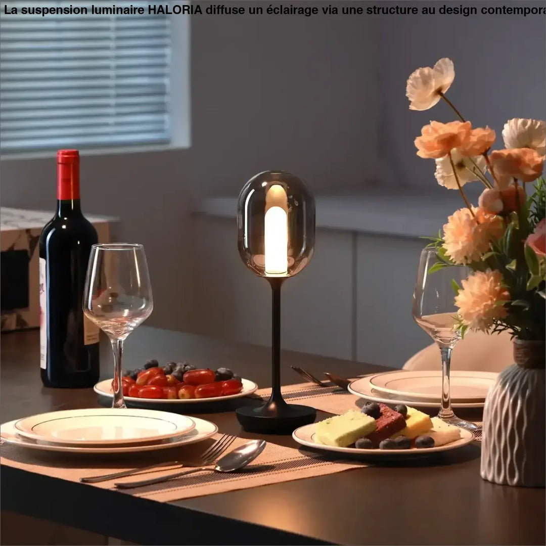 Lampe de chevet candle avec socle noir et globe en verre moderne diffusant une lumière douce pour une ambiance chaleureuse