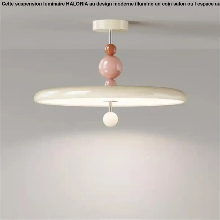 Suspension luminaire Tania en style contemporain avec accents sphériques brillants rose pastel et crème pour ambiance douce