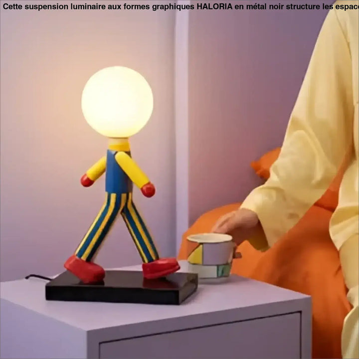 Lampe de table luzio figurine colorée avec globe lumineux blanc et corps rayé jaune noir pour table design