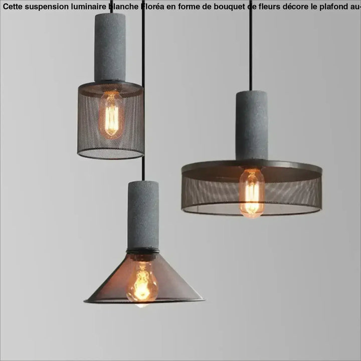 Suspension luminaire blanche floréa avec cylindres en béton, abat-jours en métal grillagé et ampoules à filament exposé