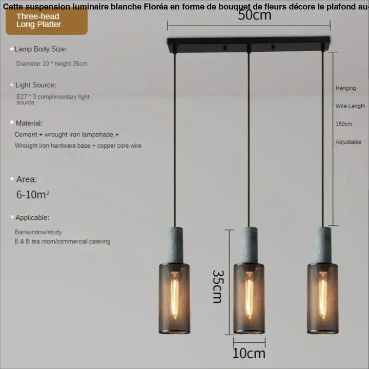 Suspension luminaire blanche floréa avec base en fer forgé noir, abat-jours en béton et cylindres en verre ambré