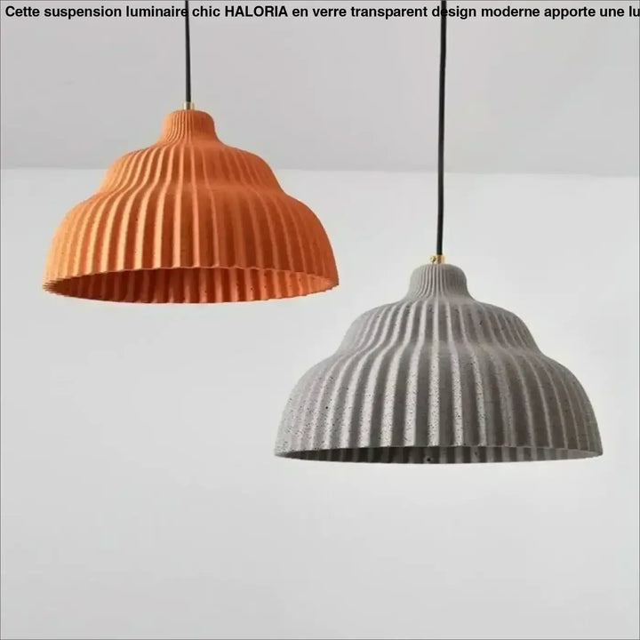 Suspension luminaire lunami avec deux abat-jours en béton nervuré terracotta et gris suspendus par cordons noirs