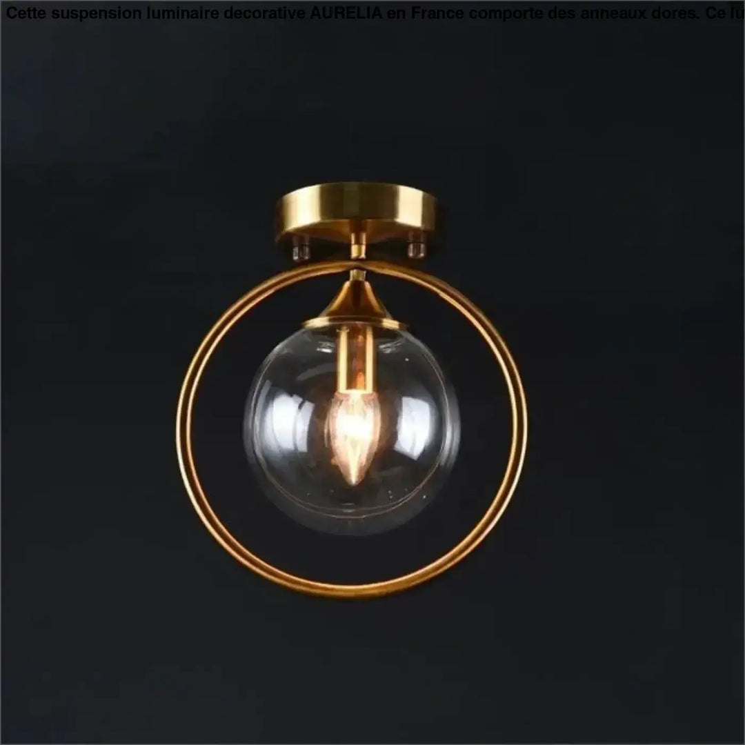 Luminaire plafonnier orbane anneau doré avec boule lumineuse en verre clair et ampoule filament exposé plafond chic