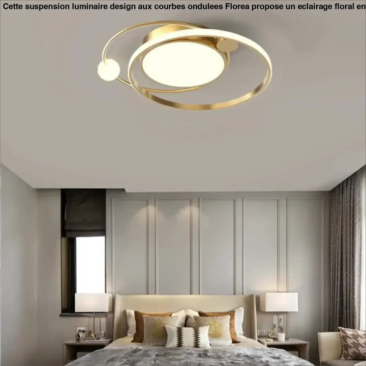 Luminaire plafonnier aloïs en métal doré avec anneaux concentriques et disque central pour lumière blanche ou chaude en salle à manger