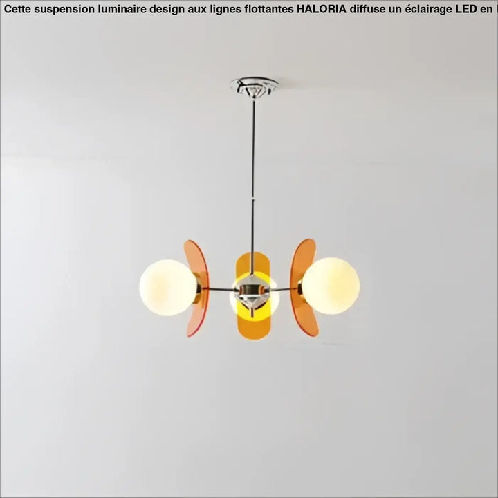 Suspension luminaire melios avec trois ampoules sphériques lumineuses et abat-jour translucides orange et jaune sur fixture chrome