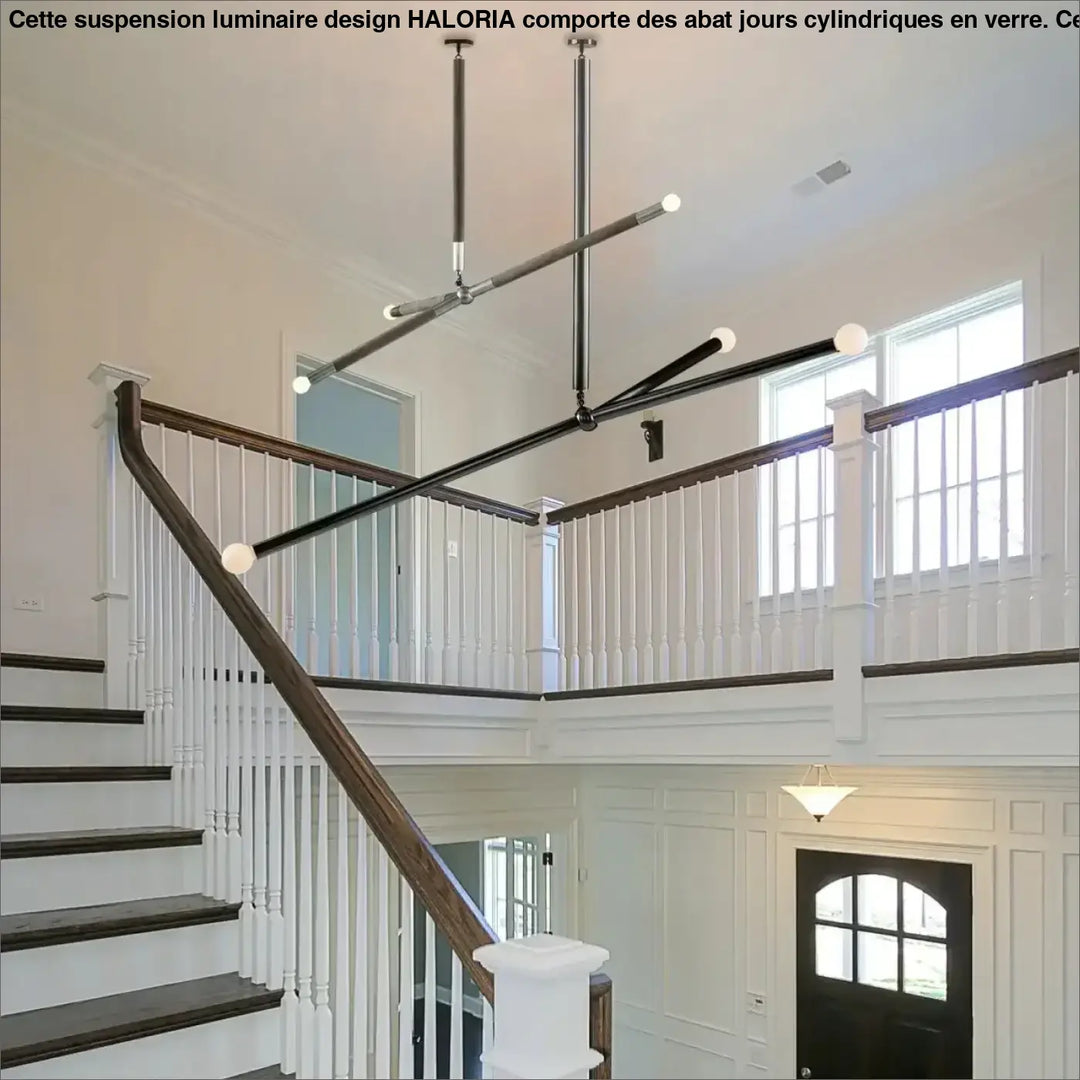 Suspension luminaire pika en chrome et noir avec globes lumineux blancs sphériques design asymétrique