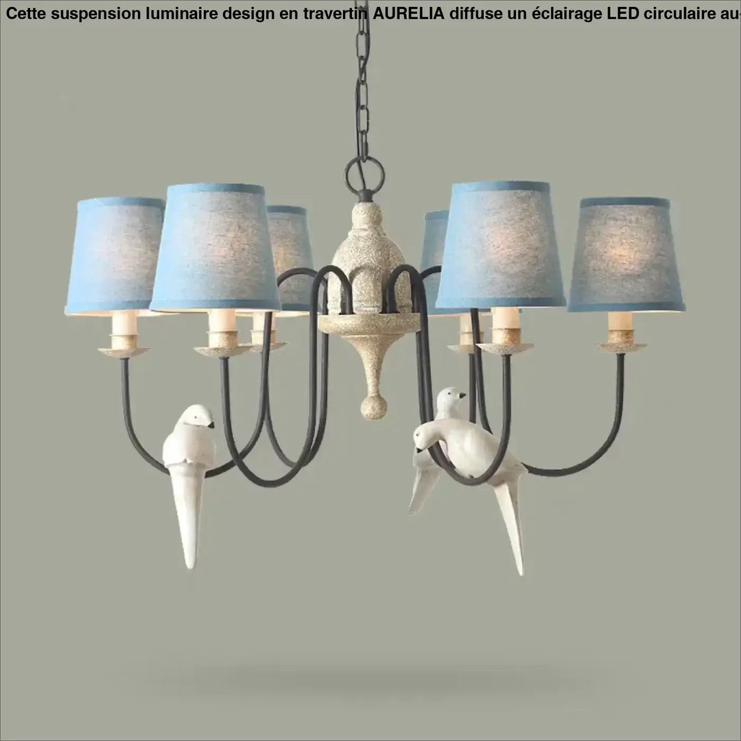 Suspension luminaire design aurelia led style travertin avec abat-jours bleu clair et oiseux en céramique au-dessus d’une table