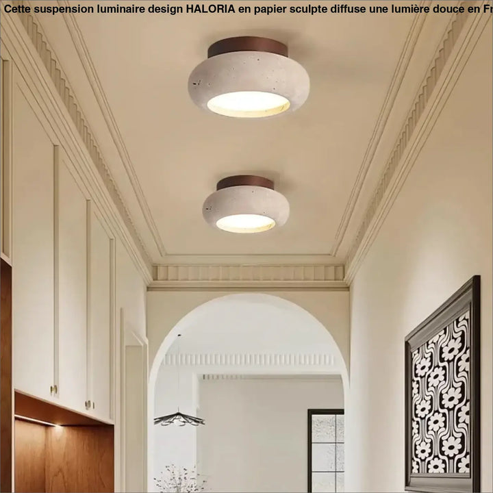 Luminaire design suspension en béton arrondi avec finition blanche mate et anneau métallique bronze foncé haloria
