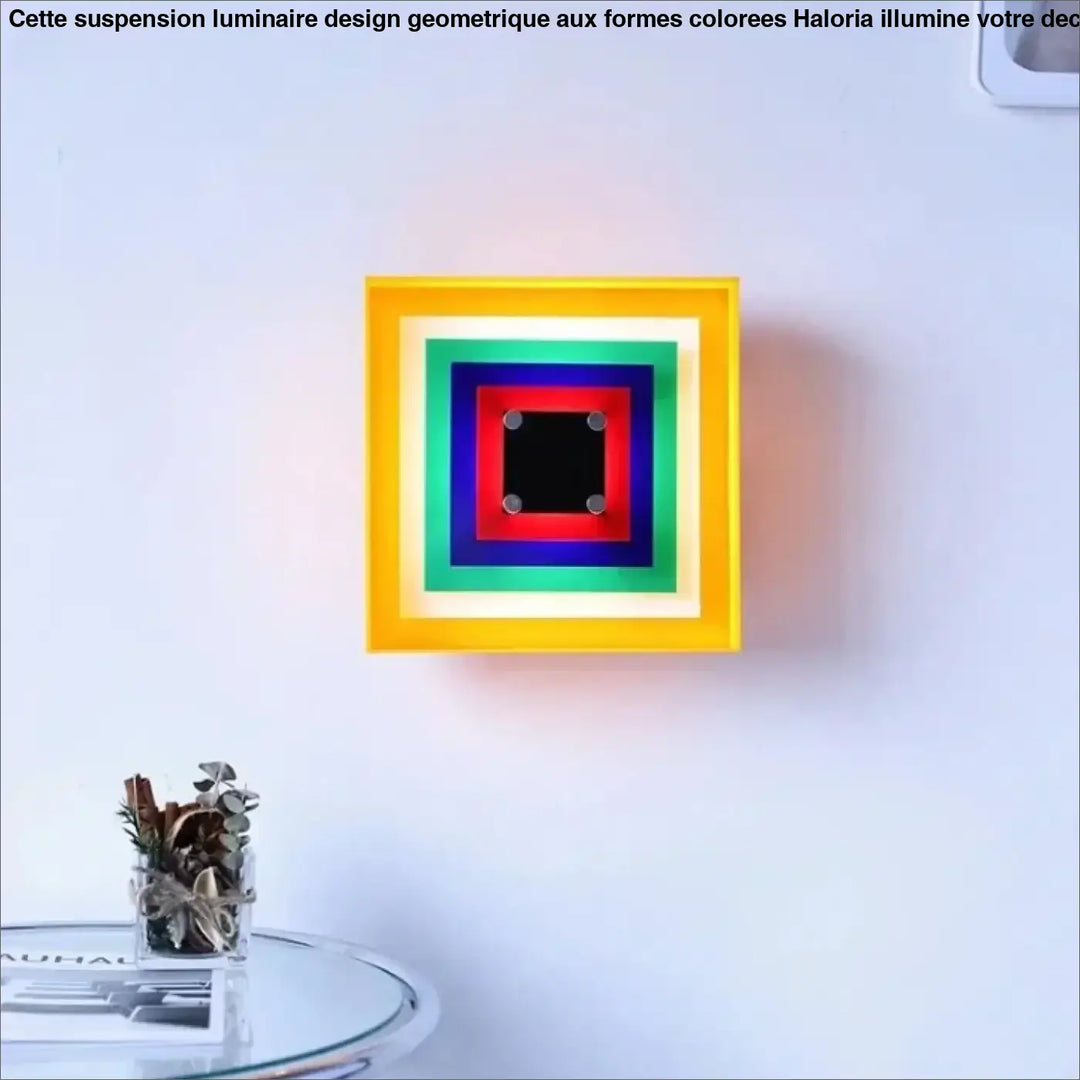 Applique murale vivao carrée avec cadres concentriques multicolores et panneau central noir pour murale design