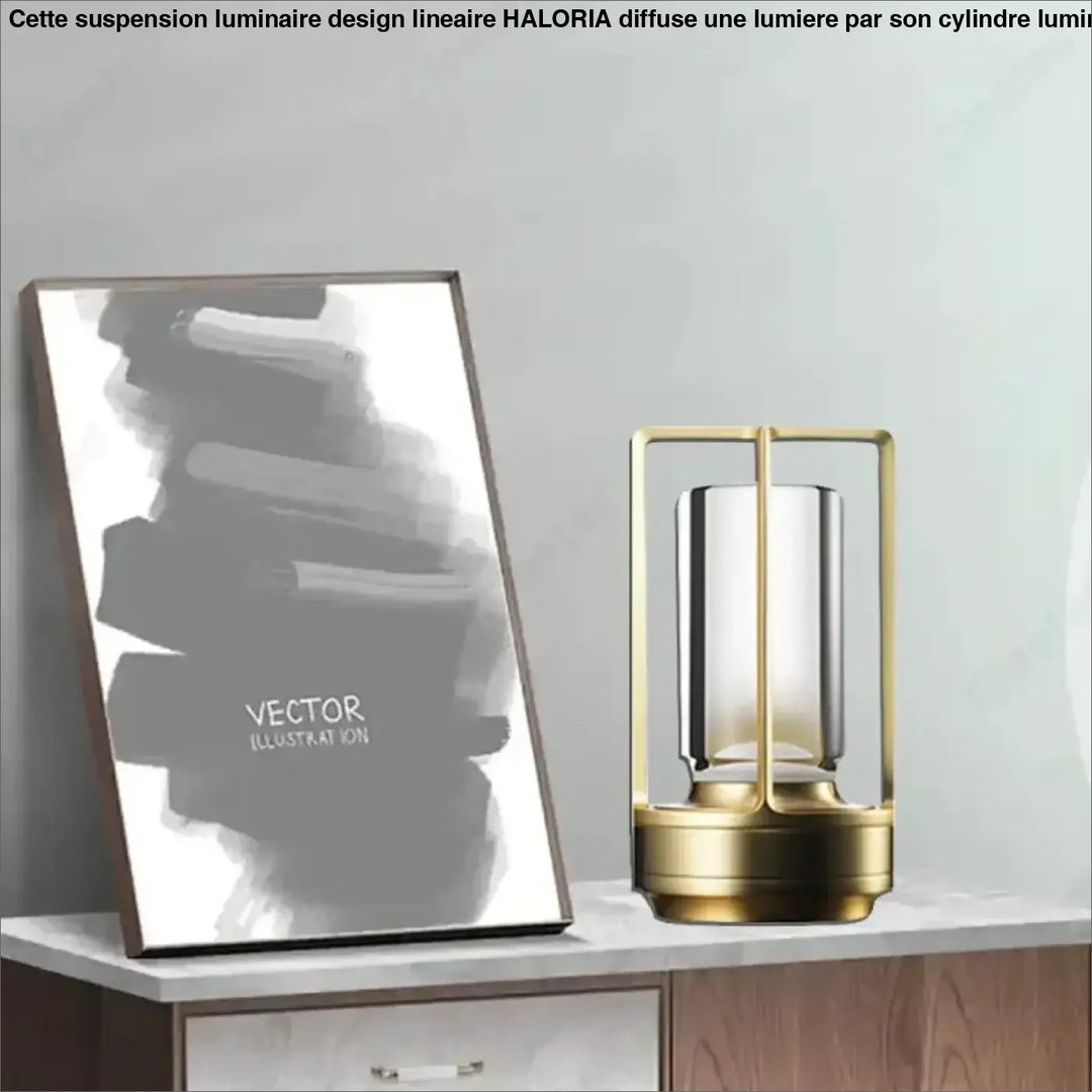 Lampe de table louane en métal doré avec verre clair cylindrique et haut dépoli pour décoration intérieure style lanterne