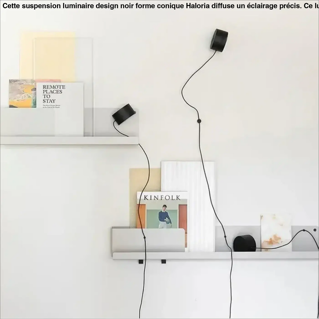 Black cylindrical wall-mounted lamps with slender black cords in suspension luminaire design noir forme conique haloria