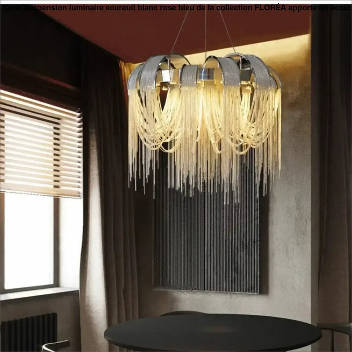 Suspension luminaire luxe avec franges en métal argenté ou doré