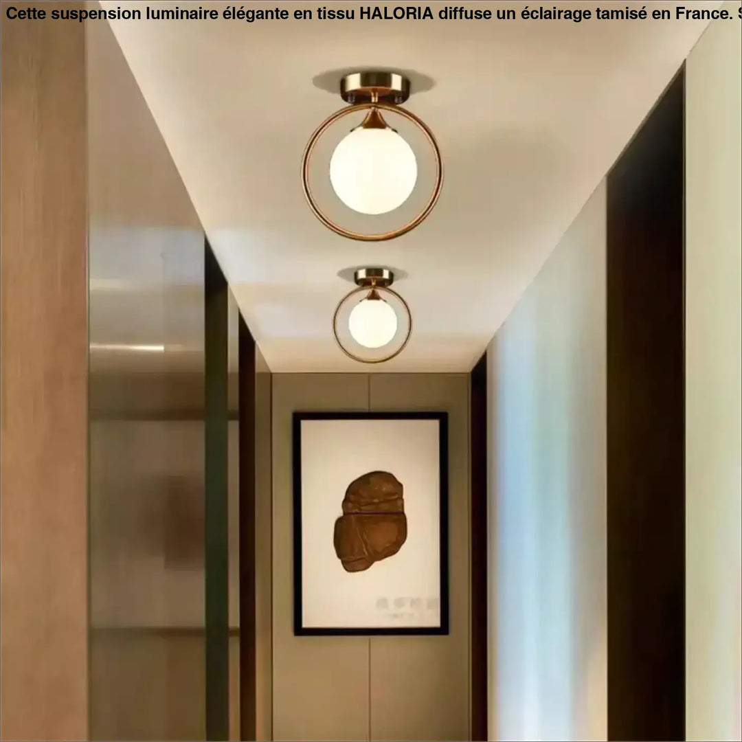 Luminaire plafonnier celliah avec structure circulaire en laiton finition moderne et globe en verre dépoli