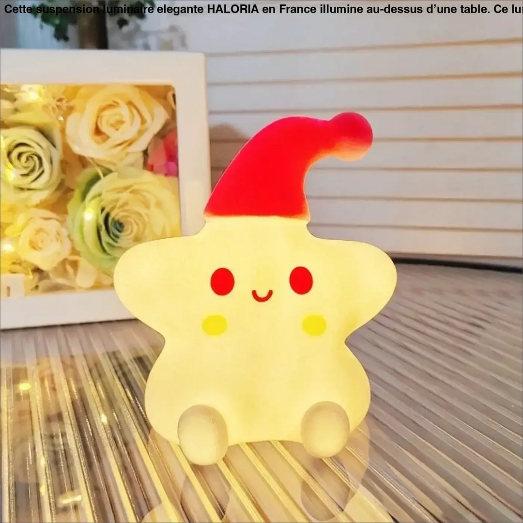 Veilleuse étoile jaune douce en forme d’étoile avec lumière douce et chapeau de père noël c’est offrir un charme unique
