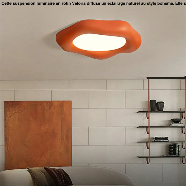 Luminaire plafonnier design orange en forme de nuage avec centre lumineux doux et plafonnier design asymétrique