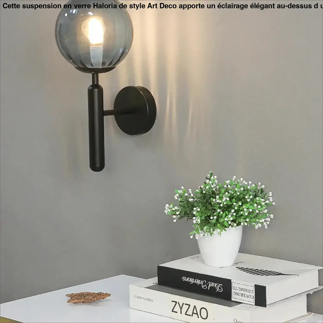 Suspension luminaire en verre style art deco élégante avec globe en verre dépoli noir pour éclairer au-dessus d’un coin salon