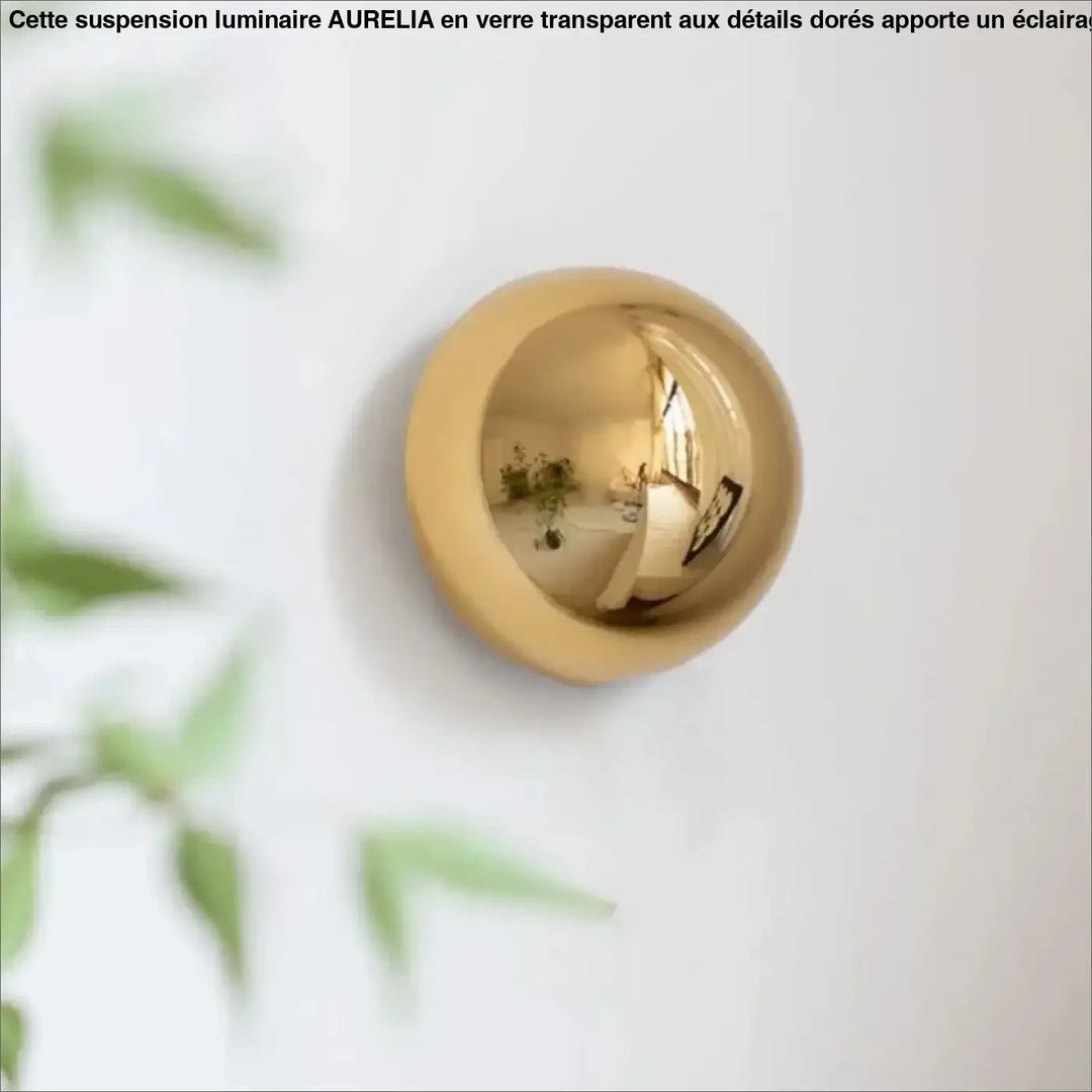 Applique murale orbys sphérique en métal miroir doré avec surface réfléchissante pour une lumière douce