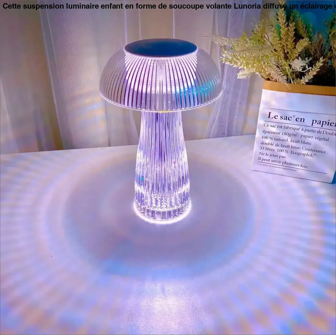 Lampe de table strilia design champignon aux reflets translucide à lumière bleue et blanche émanant de la base