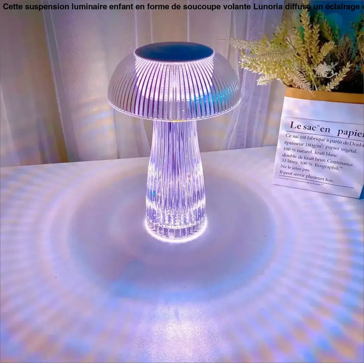 Lampe de table strilia design champignon aux reflets translucide à lumière bleue et blanche émanant de la base