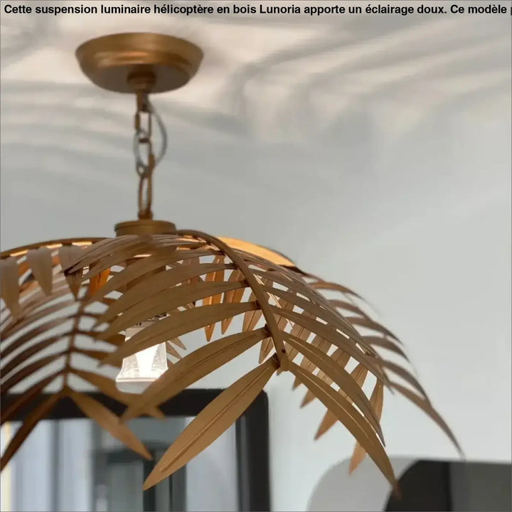 Suspension luminaire dorée au design feuillage tropical naturel