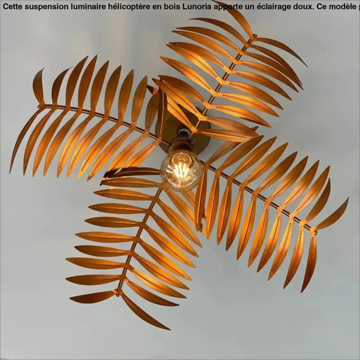 Suspension luminaire dorée au design feuillage tropical naturel