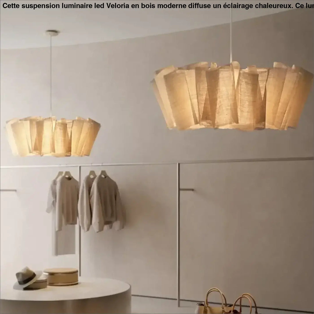 Deux suspensions luminaire led beige en papier plissé avec abat-jour en bois moderne veloria suspendues au plafond